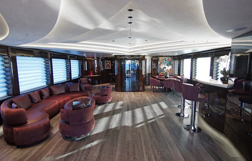 baba's yacht skylounge with red sofas
