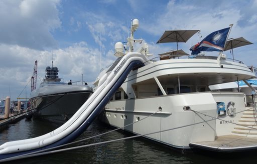 Inflatable slide attached to superyacht BG