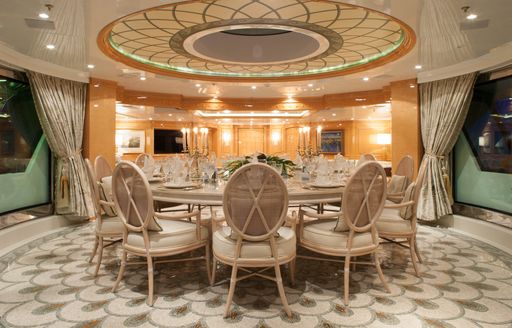 formal dining in opulent main salon on board luxury yacht St David