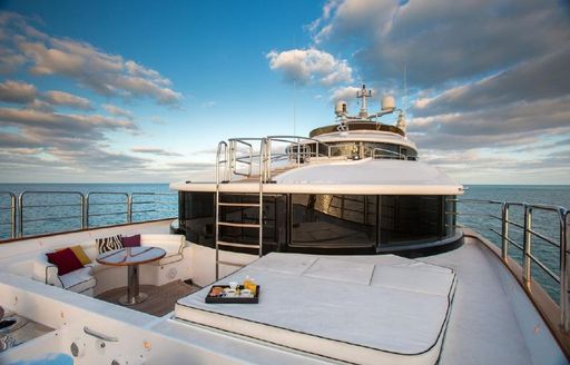 sunpads and seating area on the foredeck of luxury yacht CHECKMATE 