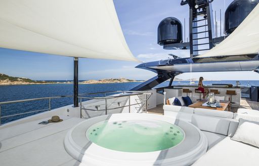Spa pool on superyacht IRISHA sundeck, with optional shading