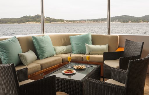 lounging area on aft deck of charter yacht L’Albatros