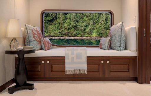 intimate snug with large window in master suite of charter yacht Endless Summer