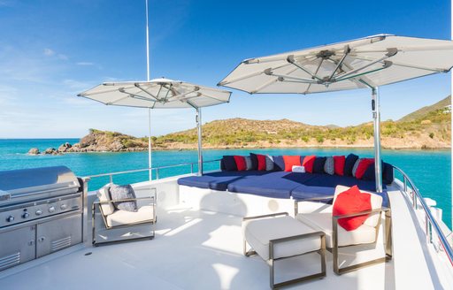 sundeck seating area on luxury yacht at last