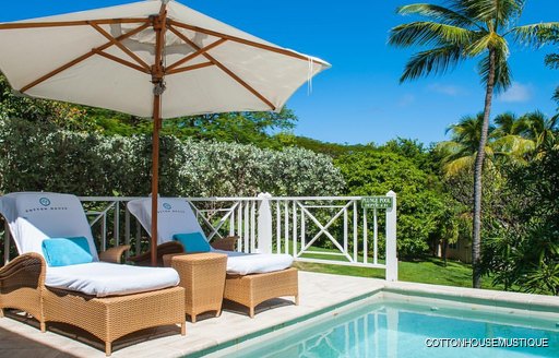 sun loungers and pool at luxury cotton house spa in Mustique