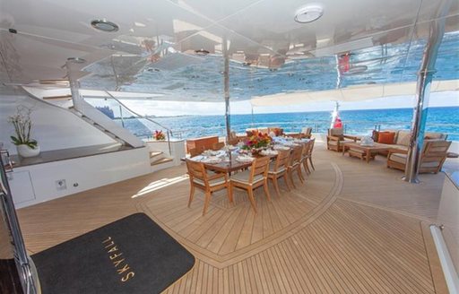 Charter guests can enjoy dinner with a view on board M/Y SKYFALL