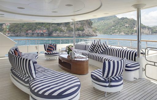 Seating area on aft deck of luxury yacht JO