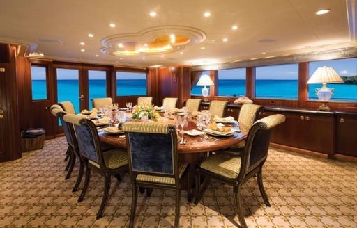 The formal dining area on board luxury yacht Never Enough