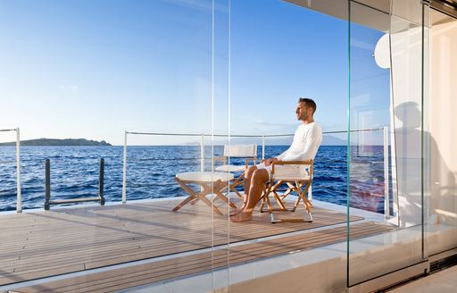 Private balcony on board charter yacht SYNTHESIS