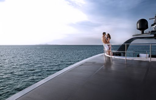 guests relax on sundeck of charter yacht Ocean Emerald 
