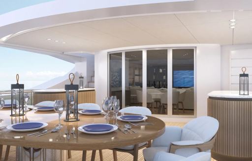 Alfresco dining area on the aft deck onboard charter yacht MAESTRO