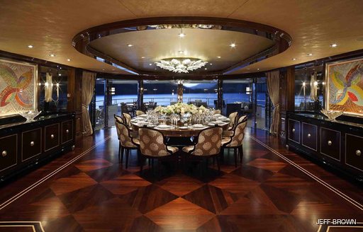 indoor dining area onboard beautiful yacht INVICUTUS