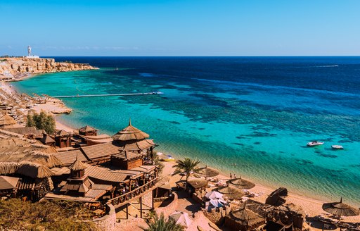 Seaside city in Egypt, with bright blue water and sandy beach