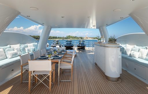 Bar space and seating area on board charter yacht La Mirage