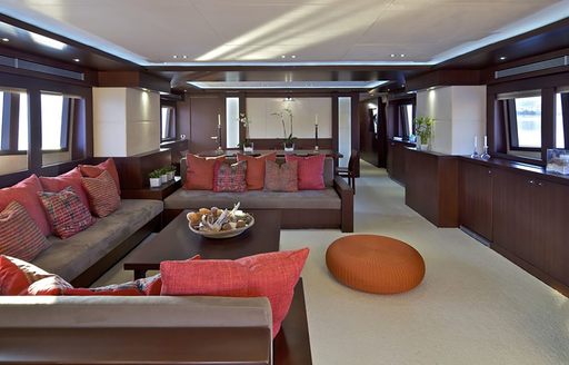 Main salon onboard charter yacht SANJANA, lounge area in foreground