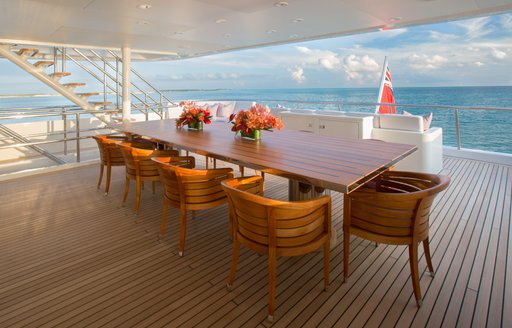 alfresco dining for 10 on upper deck of charter yacht DREAM 