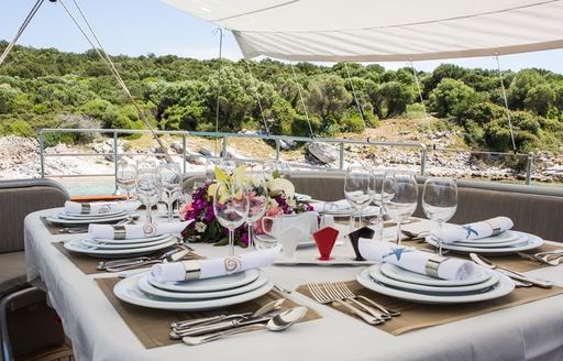 table set up for dining close up on charter yacht ‘Le Pietre’ 