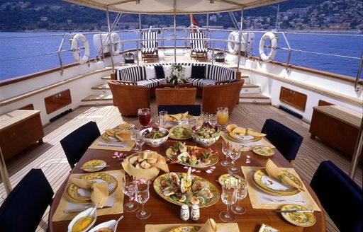 alfresco dining and lounge beyond on board charter yacht ELLEN