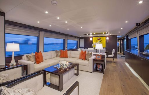 L-shaped sofa in contemporary main salon of charter yacht ‘Lady Carmen’