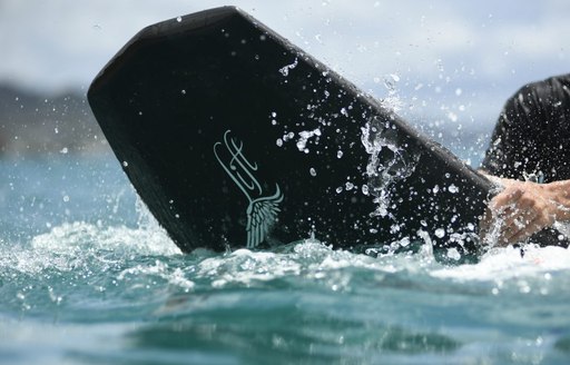 Close up of a foiling board in the water