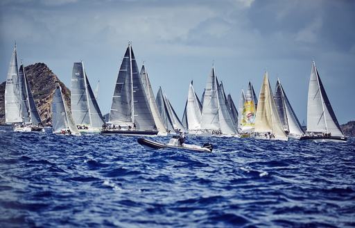 A chase boat monitors the race from afar at the Les Voiles de St Barth