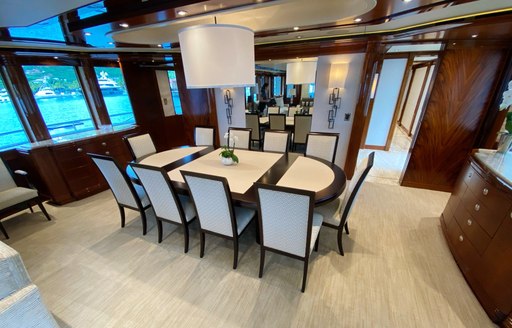 Elegant dining room and table on superyacht Chasing Daylight