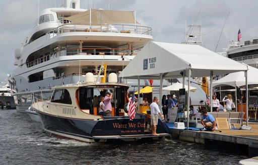 show goers take a water taxi at the Fort Lauderdale International Boat show
