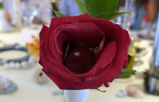 A hollowed beetroot rose used to present a starter onboard motor yacht Zaliv III