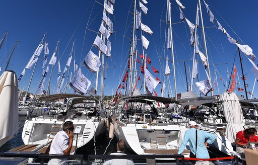 sailing yachts lined up at the Cannes Yachting Festival 2017