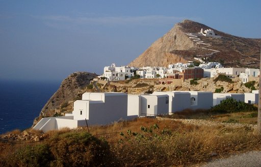 Hillside of Folegandros with white-washed buildings