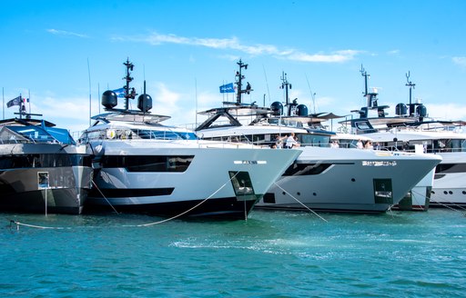 Superyacht charters berthed in line