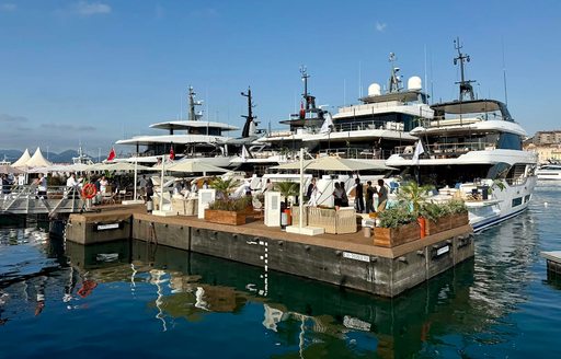 Cannes Yachting Festival superyachts berthed with visitors on board