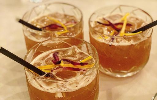 Trio of orange-colored cocktails