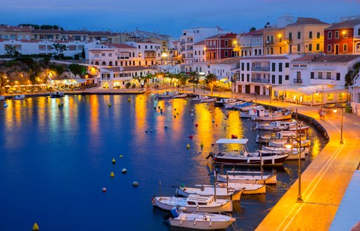 A port at night in Minorca