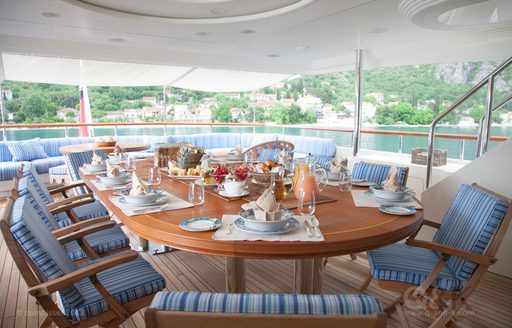 alfresco dining area on the upper deck aft of superyacht JO