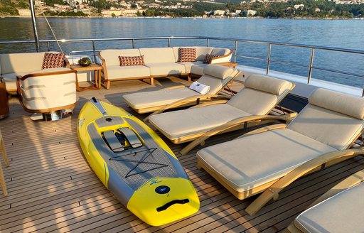 Aft lounging area onboard charter yacht W