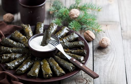 Plate with Dolma - stuffed grape leaves with meat