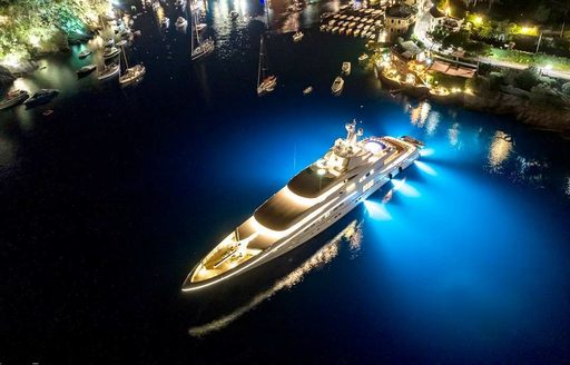superyacht SECRET anchors at night nearby a harbour on a Mediterranean yacht charter