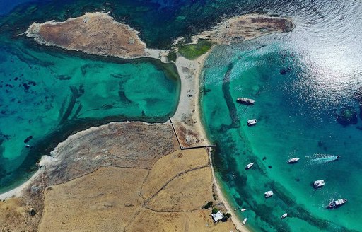 Mykonos - Rineia boats coast aerial view