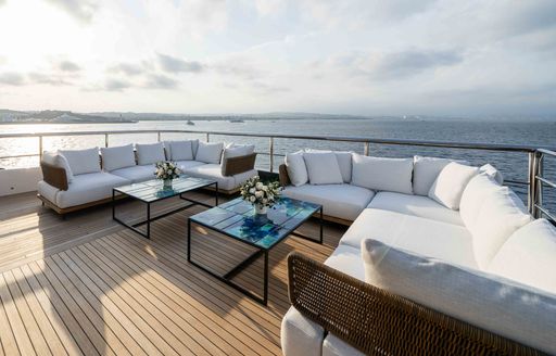 Charter yacht SYMMETRY exteriors with white seating