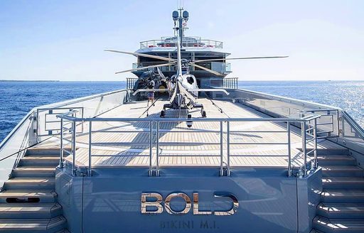 Helicopter on board charter yacht BOLD