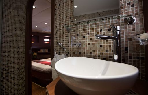 modern, tiled bathroom on board charter yacht ‘Orient Pearl’