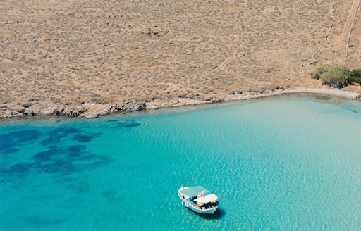 Mykonos - Rineia boats coast aerial view