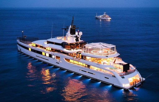 Feadship superyacht lady s at anchor in at night