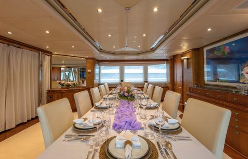 Charter yacht AZUL V interior dining table set for a meal