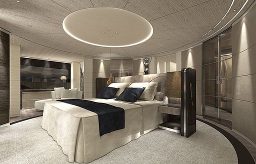 Elegant cabin on superyacht SEVERIN'S, showing double bed and light colored furnishings