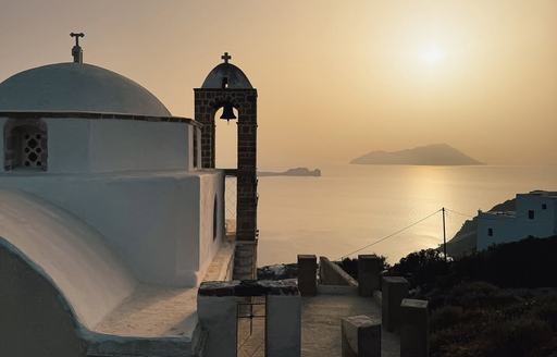 Overview of Plaka Castle and surrounding view at sunset