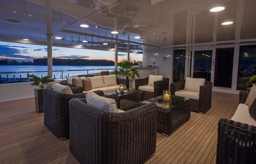 An exterior lounging area on board motor yacht 'Double Down'