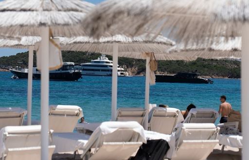 Porto Cervo - White Beach Club beach loungers yachts