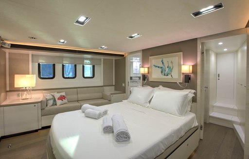 large bed in the light and airy master suite on board luxury yacht ARCHSEA 